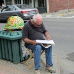 Sketch artist on Main Street in Rockland, Maine during the Maine Boats, Homes and Harbors Show