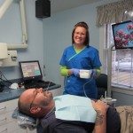 Before we remove the two lower teeth, we have Anastasia check Michael's blood Pressure.