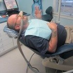 Nitrous Oxide is classified as a sedative. It doesn't block pain, it basically helps you to relax. Helps you get to that happy place. Another reason that we are big fans of Nitrous Oxide is because it is so safe and is short lasting. 5 minutes after you turn it off, all Nitrous Oxide has left your body, allowing you to carry on with your normal activities.