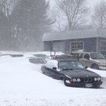 The cars are burried in the snow.