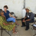 Kandice Bird Medina R.N. translates for Dr. Bates D Moses.