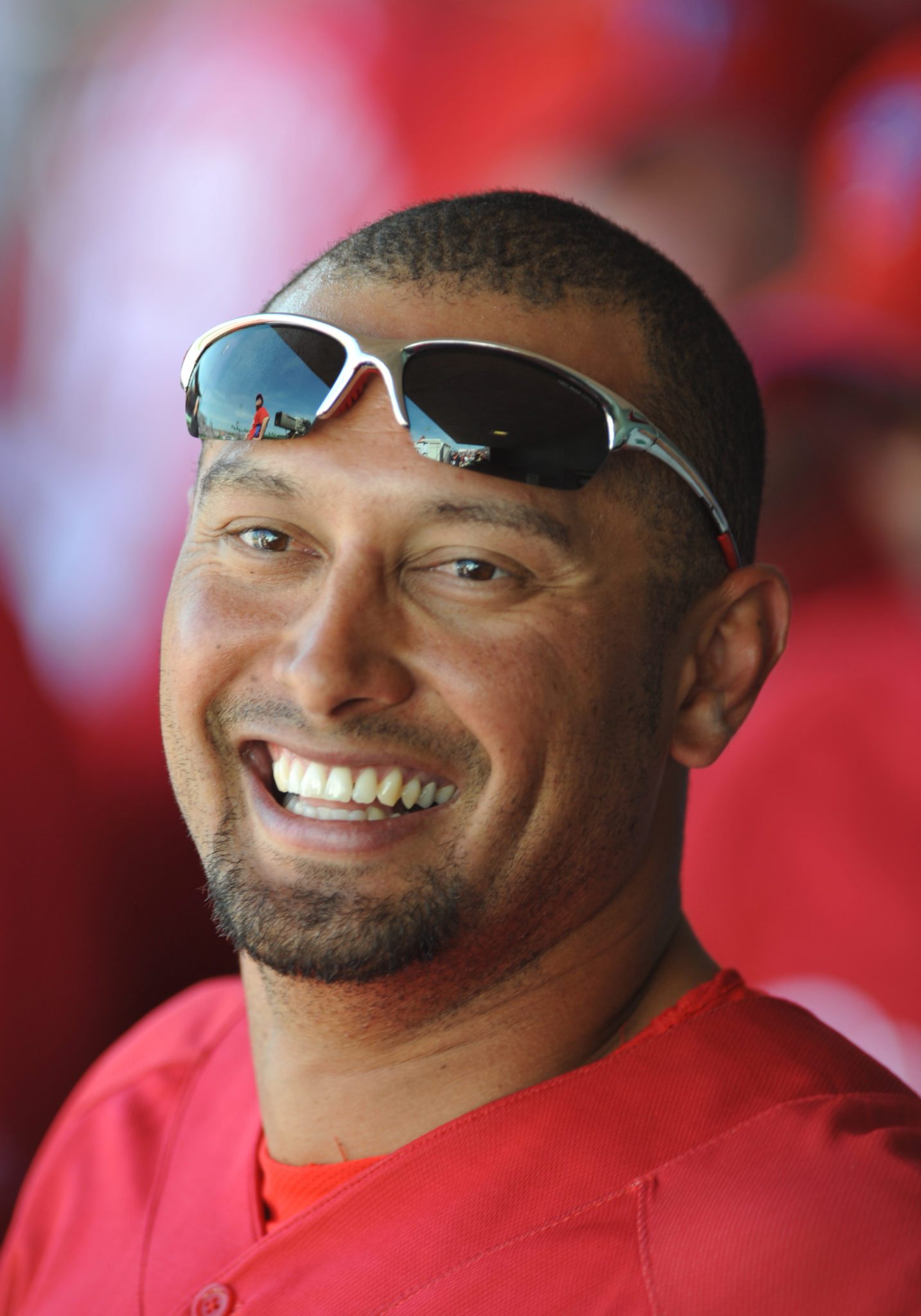 CLEARWATER, FL - FEBRUARY 28: Outfielder Shane Victorino #8 of the Philadelphia Phillies watches play from the dugout against the Tampa Bay Rays February 28, 2009 at Bright House Field in Clearwater, Florida. (Photo by Al Messerschmidt/Getty Images)