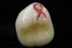 Breast Cancer Ribbon Tooth Tattoo
