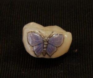 Butterfly Tooth Tattoo