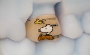 Snoopy n Woodstock Tooth Tattoo