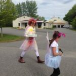 Dr. Medina is asked to carry the Cinnamon rolls to the end. Color Run 2017