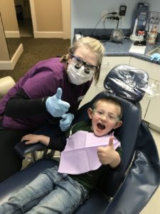 Oliver is all smiles at his last dental cleaning with Samantha