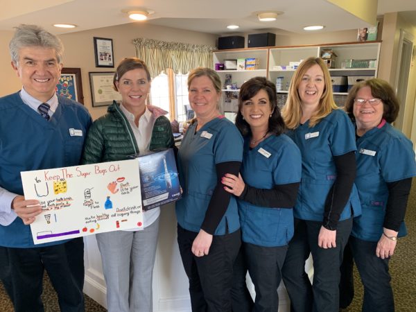 Tammy King and Local Appleton Students' Posters Promote Sparkling SmilesTammy